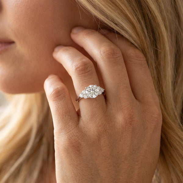 Platinum Heart Cut Brilliant Diamond Cluster Accent Solitaire Ring with Prong Setting