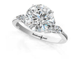 White gold Round Brilliant Diamond Solitaire Ring with Pear Side Stones and Four-Prong Setting_61