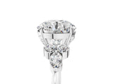 White gold Round Brilliant Diamond Solitaire Ring with Pear Side Stones and Four-Prong Setting_68