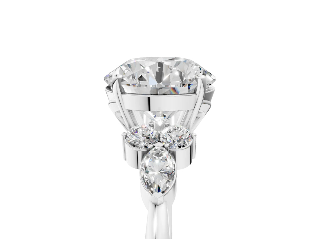 White gold Round Brilliant Diamond Solitaire Ring with Pear Side Stones and Four-Prong Setting_91