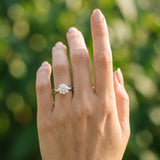 White gold Round Brilliant Diamond Solitaire with Marquise Side Stones on a Twisted Band and Four-Prong Setting_28