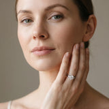 White gold Round Brilliant Diamond Solitaire with Marquise Side Stones on a Twisted Band and Four-Prong Setting_29