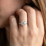 White gold Round Brilliant Diamond Solitaire with Marquise Side Stones on a Twisted Band and Four-Prong Setting_30