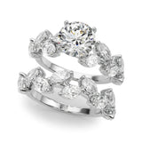 White gold Round Brilliant Diamond Solitaire with Marquise and Pear Accent Stones on a Split Shank Band with Four-Prong Setting 1