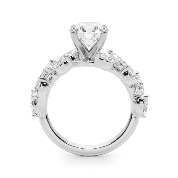 White gold Round Brilliant Diamond Solitaire with Marquise and Pear Accent Stones on a Split Shank Band with Four-Prong Setting