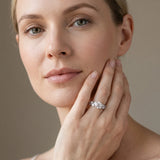 White gold Round Brilliant Diamond Solitaire with Marquise and Pear Accent Stones on a Split Shank Band with Four-Prong Setting_28
