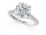 White gold Round Brilliant Diamond Solitaire with Pavé Band and Four-Prong Setting 1