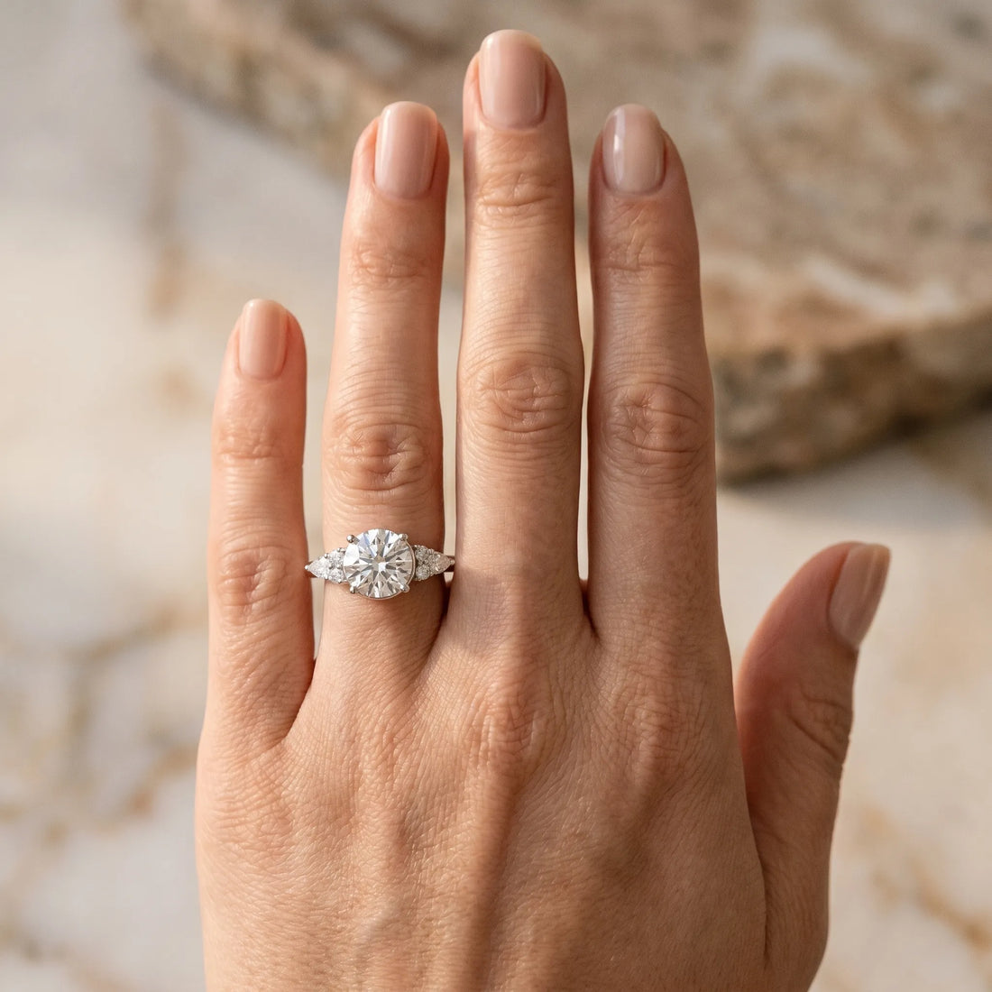 White gold Round Brilliant Diamond Solitaire with Side Stones on a Tapered Band and Four-Prong Setting_27