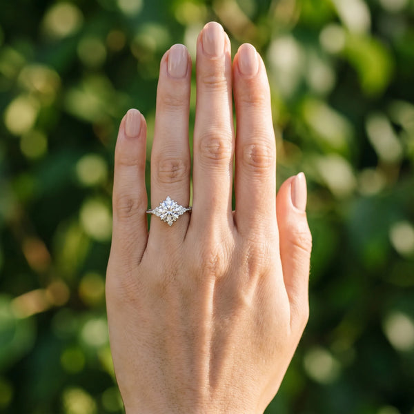 Platinum Cushion Cut Brilliant Diamond with Cluster Setting on a Beaded Band and Four-Prong Setting
