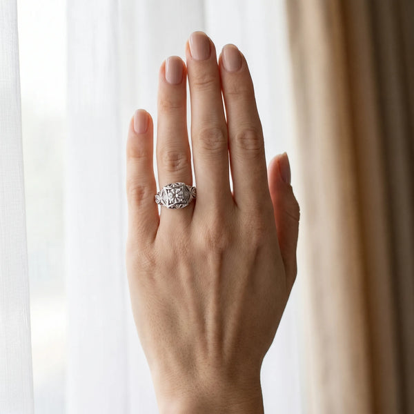 White gold Round Brilliant Milgrain Filigree Solitaire with Bezel and Prong Setting
