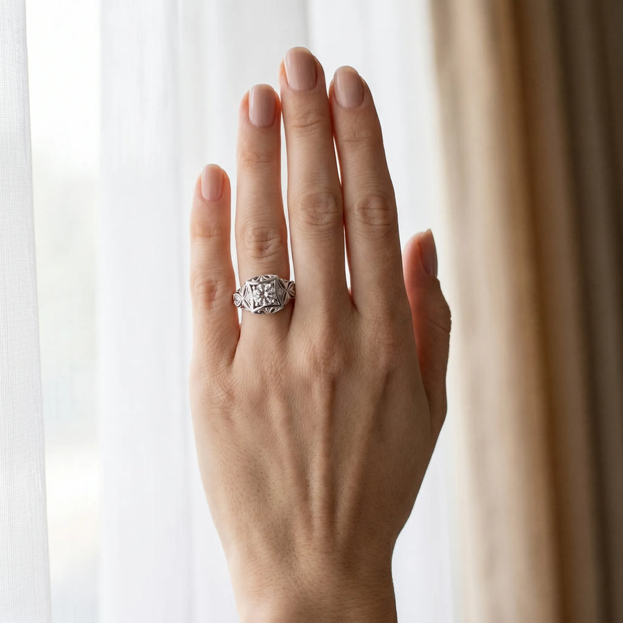 White gold Round Brilliant Milgrain Filigree Solitaire with Bezel and Prong Setting
