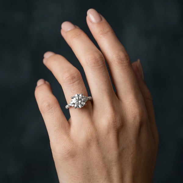 White gold Round Brilliant Pave Diamond Engagement Ring with Cathedral Band and Four-Prong Setting