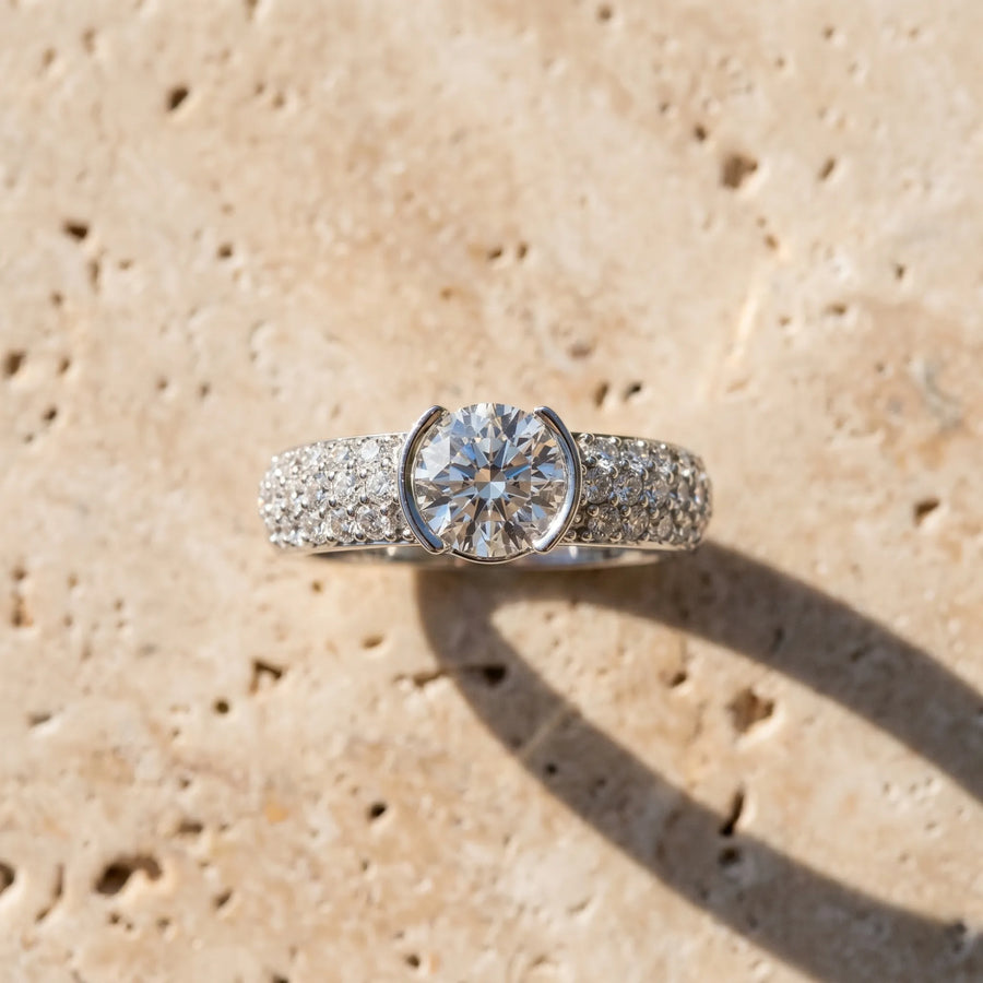 White gold Round Brilliant Pave Diamond Engagement Ring with Tension Prong Setting