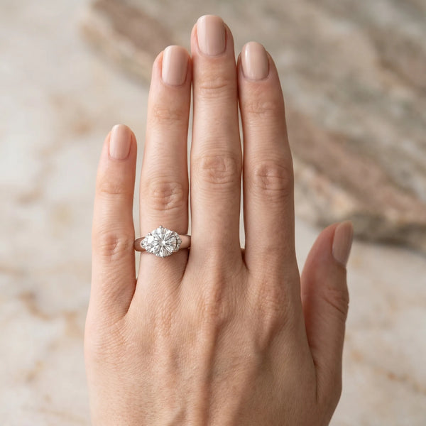White gold Round Brilliant Solitaire Cathedral Engagement Ring with Pave Accents