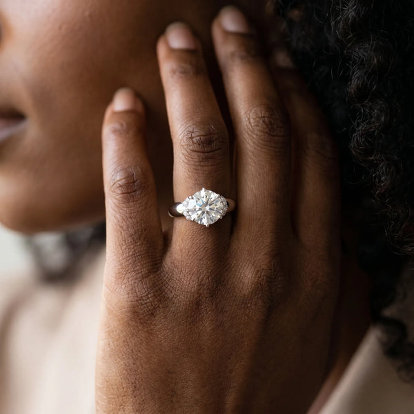 White gold Round Brilliant Solitaire Cathedral Engagement Ring with Pave Accents