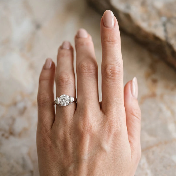 White gold Round Brilliant Solitaire Diamond Ring with Channel Set Band and Bar Prong Setting