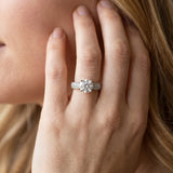White gold Round Brilliant Solitaire Engagement Ring with Pave Band and Four-Prong Setting_8