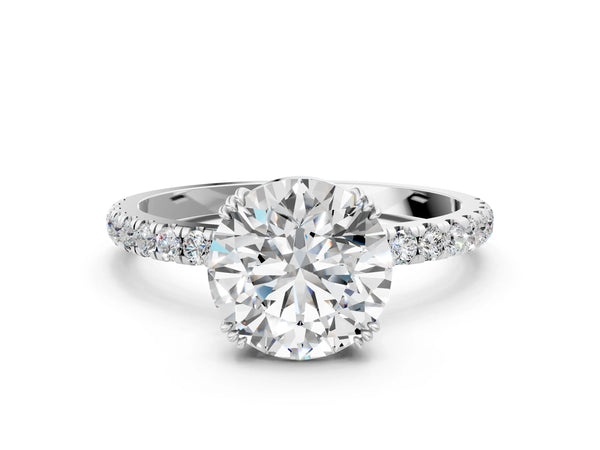 White gold Round Brilliant Solitaire with Pavé Band and Claw Prong Setting