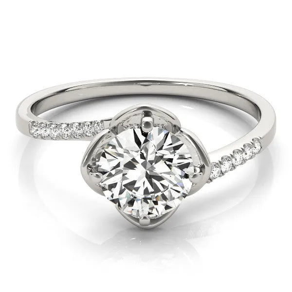 White gold Round Brilliant Solitaire with Pavé Band and Four-Prong Cushion Setting