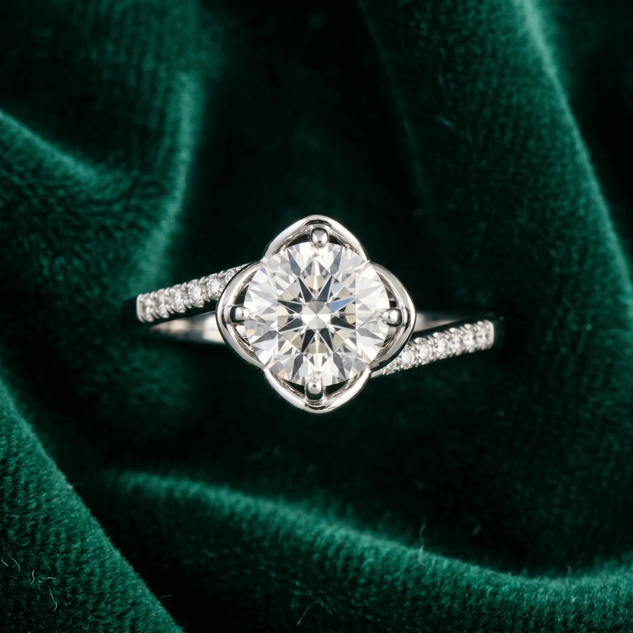 White gold Round Brilliant Solitaire with Pavé Band and Four-Prong Cushion Setting