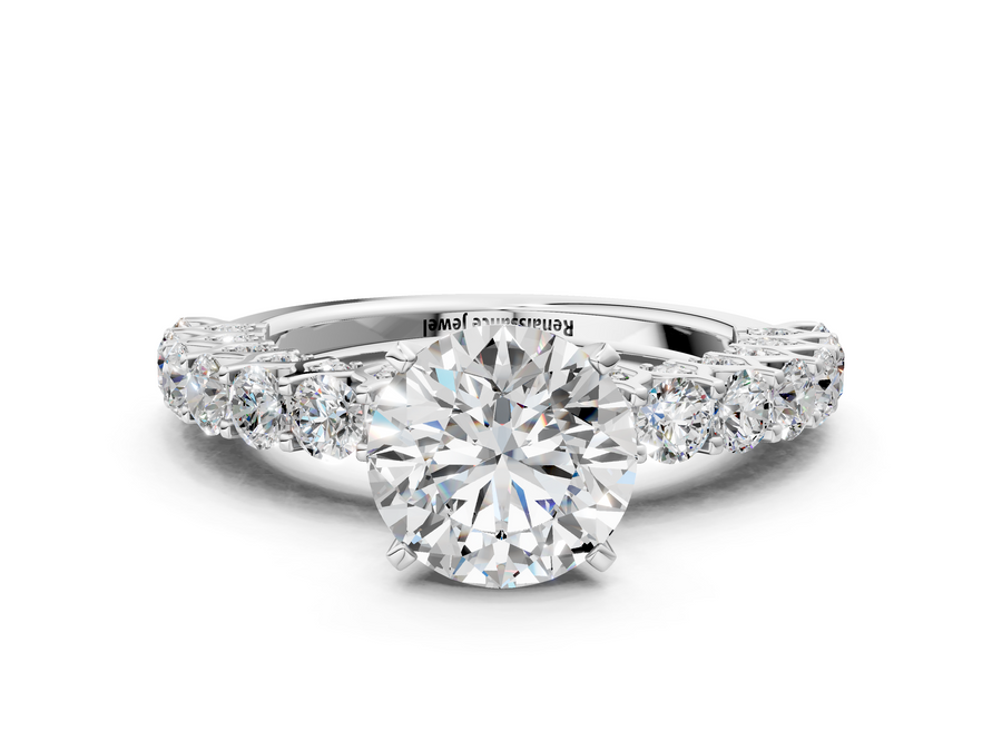 White gold Round Cut Diamond Solitaire Ring with Shared Prong Pavé Band and Four-Prong Setting