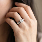White gold Round Brilliant Solitaire with Side Stones on a Pave Band and Four-Prong Setting_156