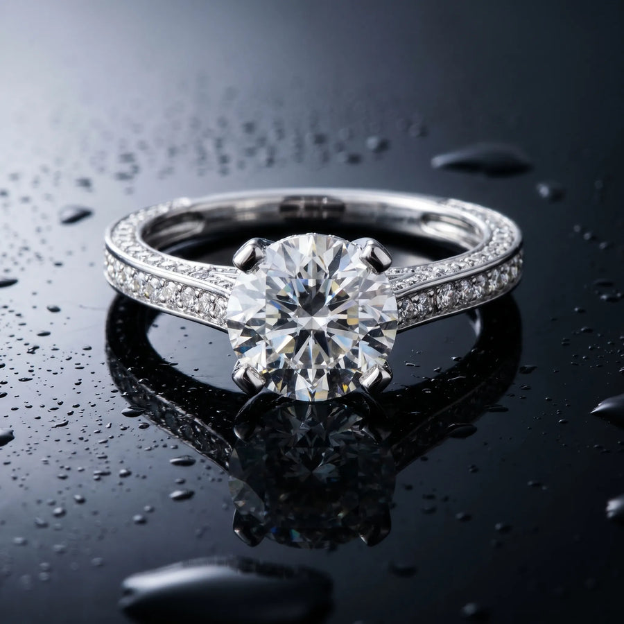 White gold Round Brilliant Split Shank Pave Solitaire Ring with Four-Prong Setting