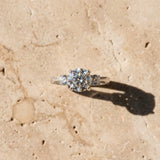 White gold Round Brilliant Three-Stone Diamond Ring with Pavé Band and Four-Prong Setting_48