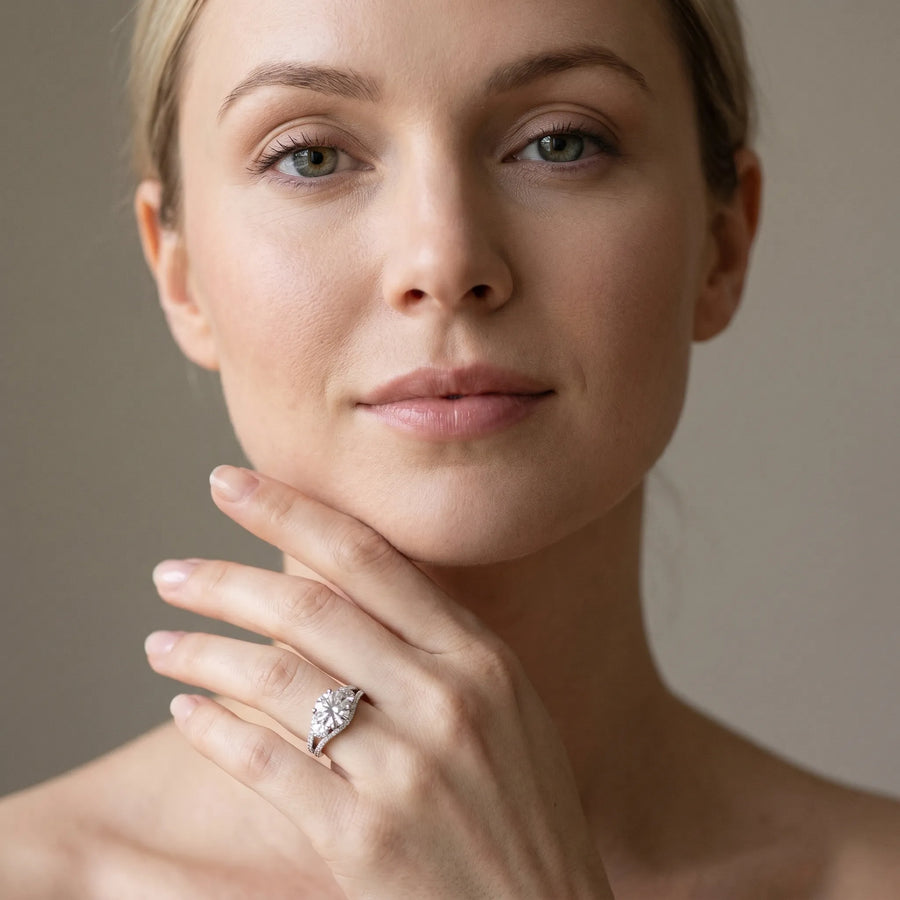 White gold Round Brilliant Three-Stone Diamond Ring with Pavé Band and Prong Setting