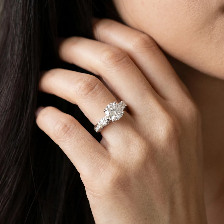 White gold Round Brilliant Three-Stone Pave Band with Four-Prong Setting