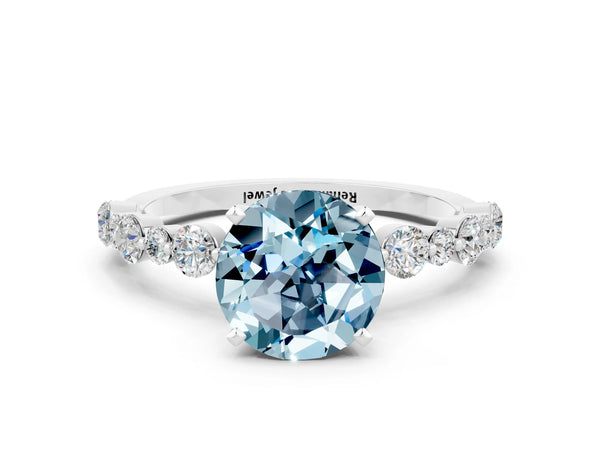 Silver Round Cut Aquamarine Prong Set Engagement Ring with Pavé Band