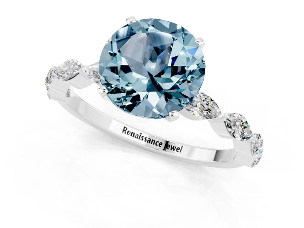 Silver Round Cut Aquamarine Ring with Marquise Side Stones and Prong Setting