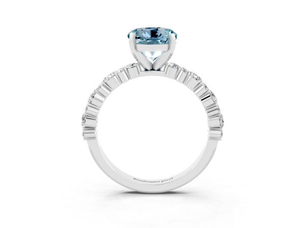 Platinum Round Cut Aquamarine Side Stone Solitaire Ring with Round  and Four-Prong Setting