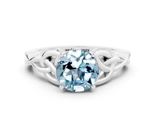 White gold Round Cut Aquamarine Solitaire Celtic Knot Ring with Four-Prong Setting