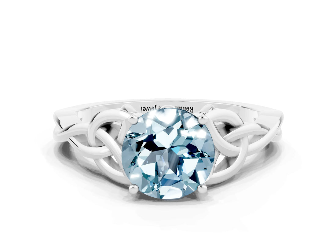 White gold Round Cut Aquamarine Solitaire Engagement Ring with Celtic Knot Band and Four-Prong Setting
