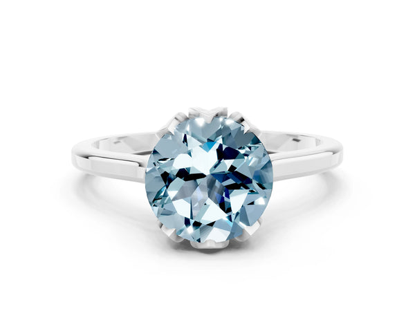Silver Round Cut Aquamarine Solitaire Ring with Flower Prong Setting and Classic Band