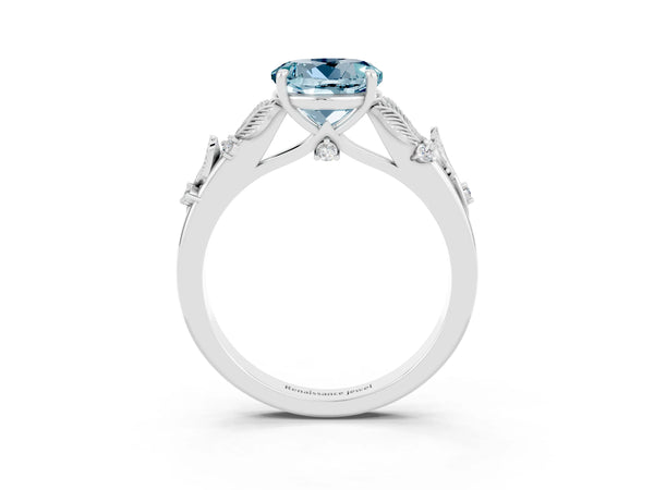 Silver Round Cut Aquamarine Solitaire Ring with Leaf Motif Band and Four-Prong Setting
