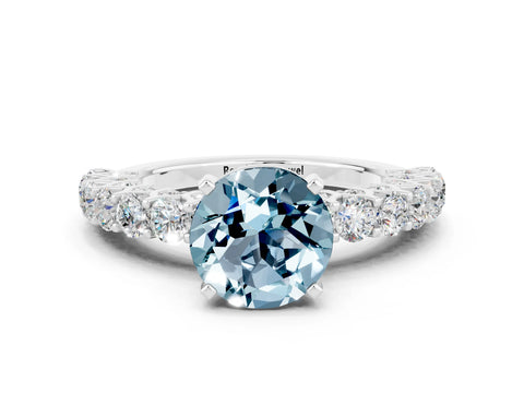 White gold Round Cut Aquamarine Solitaire Ring with Shared Prong Pavé Band and Four-Prong Setting