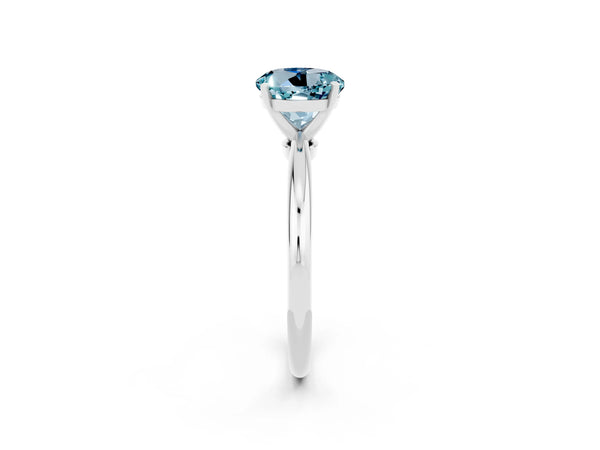 Platinum Round Cut Aquamarine Solitaire Ring with Six-Prong Setting and Classic Band