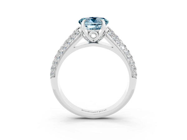 Platinum Round Cut Aquamarine Solitaire Ring with Three-Row Pavé Band and Four-Prong Setting