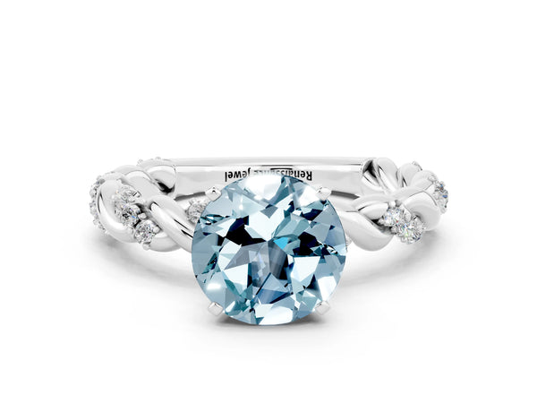 Platinum Round Cut Aquamarine Solitaire Ring with Twisted Band and Pavé Accents
