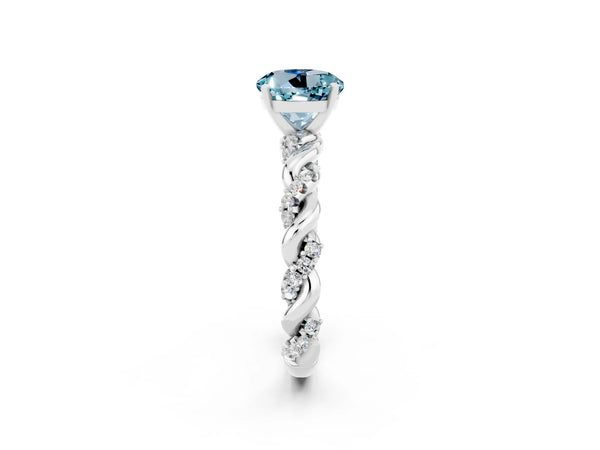 Platinum Round Cut Aquamarine Solitaire Ring with Twisted Band and Pavé Accents