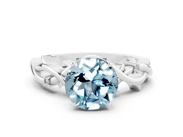White gold Round Cut Aquamarine Solitaire Ring with Twisted Band and Prong Setting