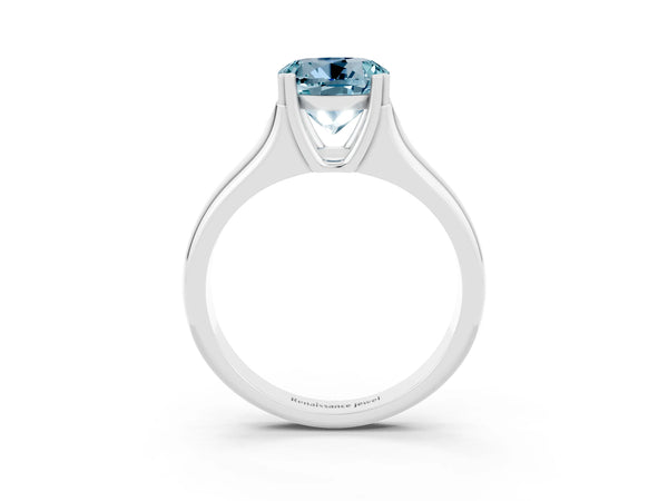 Platinum Round Cut Aquamarine Solitaire Ring with Wide Band and Prong Setting