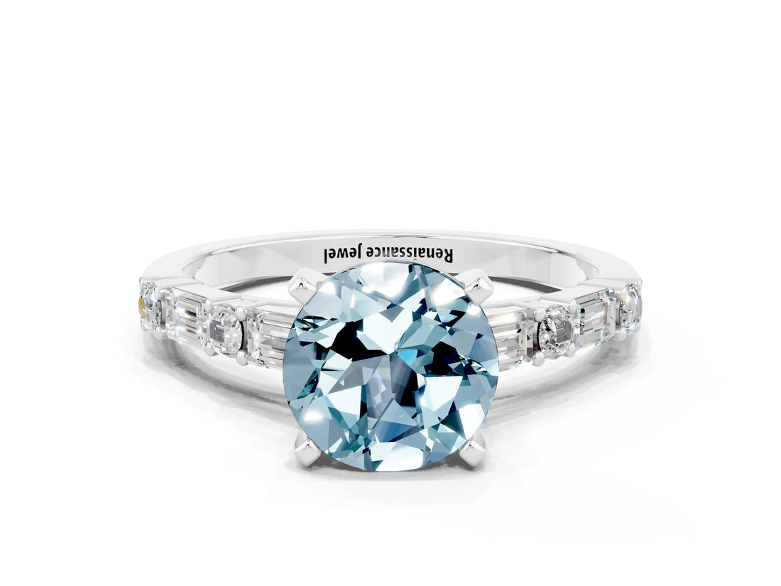 White gold Round Cut Aquamarine Solitaire with Side Baguettes and Channel Set Band