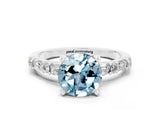 White gold Round Cut Aquamarine Solitaire with Side Baguettes and Channel Set Band