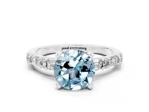 White gold Round Cut Aquamarine Solitaire with Side Baguettes and Channel Set Band