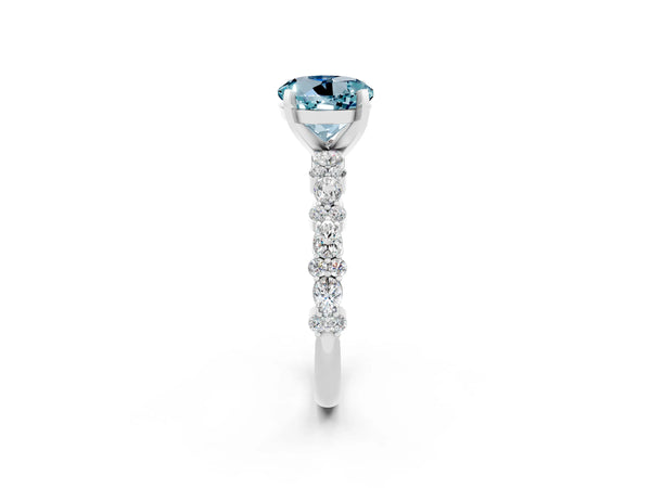 Silver Round Cut Aquamarine Side Stone Solitaire Ring with Round  and Four-Prong Setting
