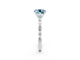 White gold Round Cut Aquamarine Solitaire with Side Stones on a Pavé Band and Four-Prong Setting_2