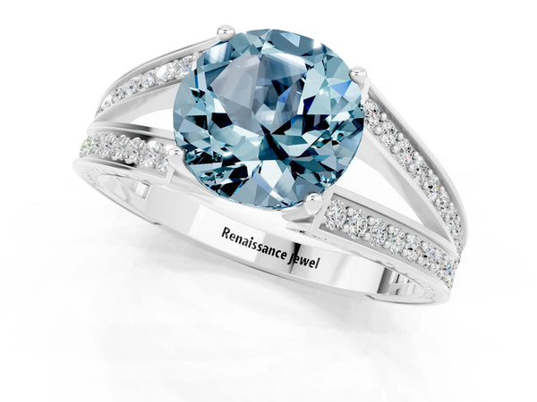 Silver Round Cut Aquamarine Split Shank Ring with Pavé Band and Four-Prong Setting
